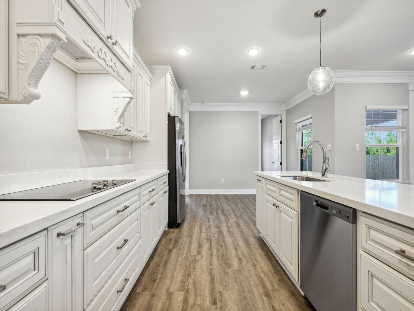 Kitchen in the Elliott floorplan at a Meritage Homes community in Gulfport, MS.