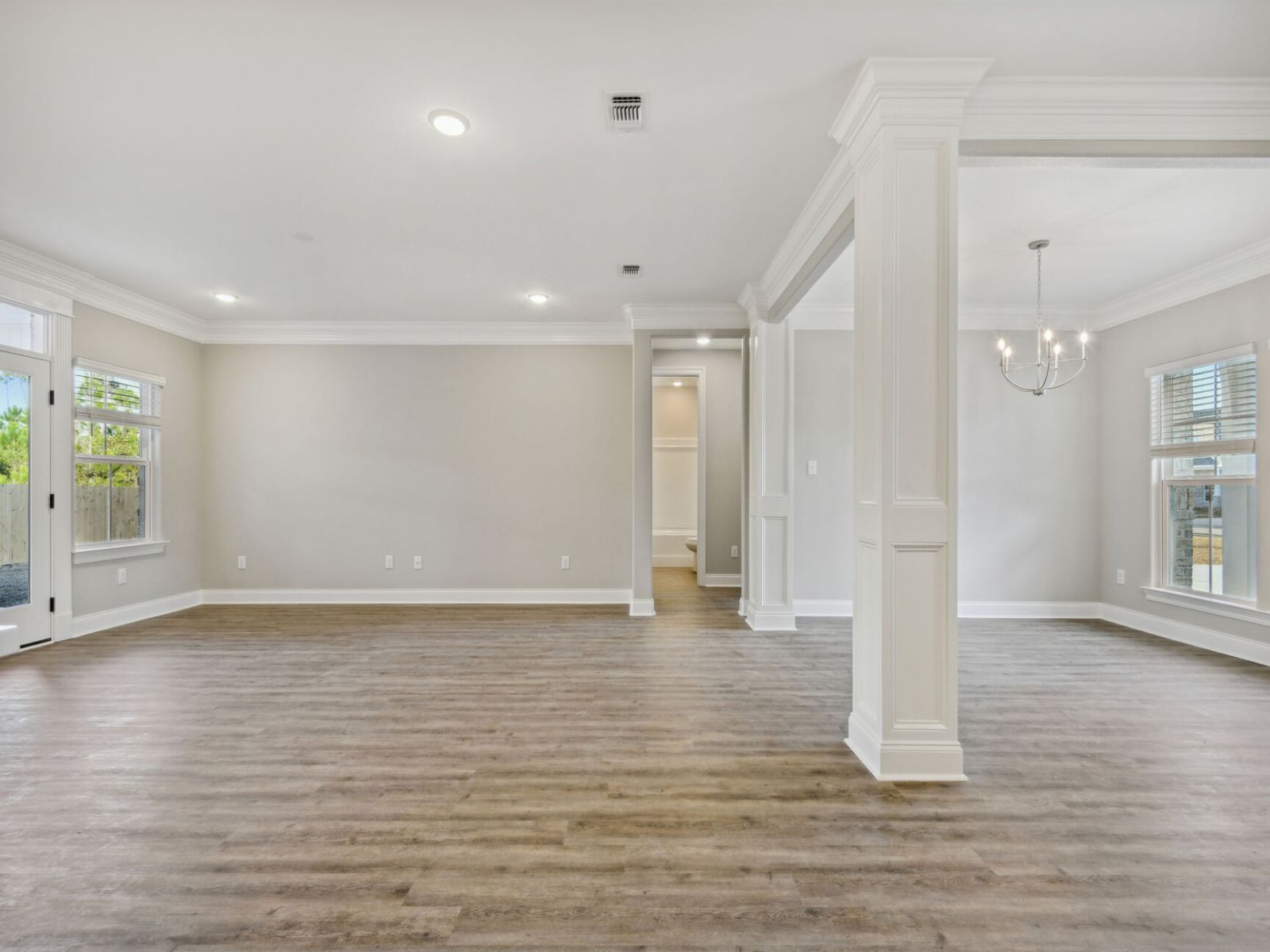 Great room in the Elliott floorplan at a Meritage Homes community in Gulfport, MS.