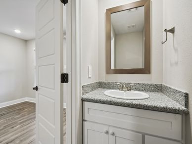 Secondary bathroom in the Parker floorplan at a Meritage Homes community in Gulfport, MS.
