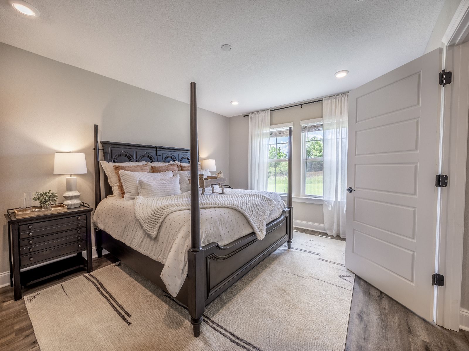 Primary bedroom in the Kai floorplan at a Meritage Homes community in Gulfport, MS.