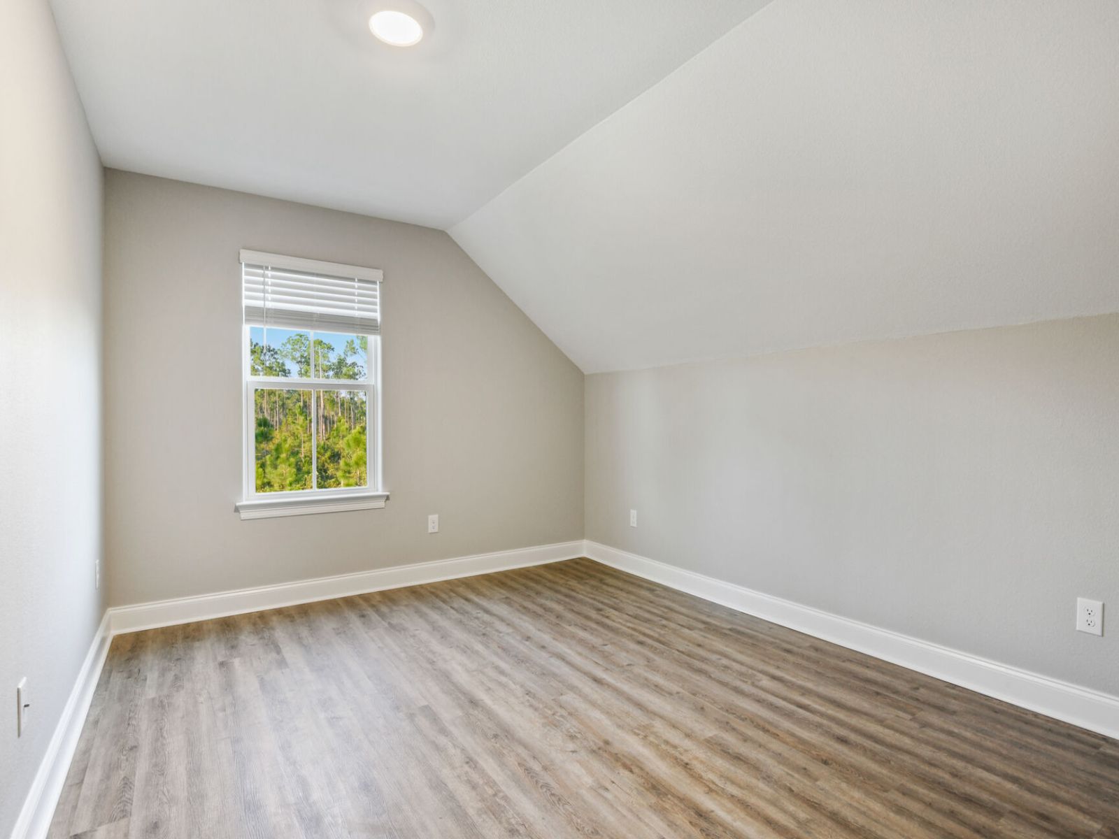 Secondary bedroom in the Elliott floorplan at a Meritage Homes community in Gulfport, MS.