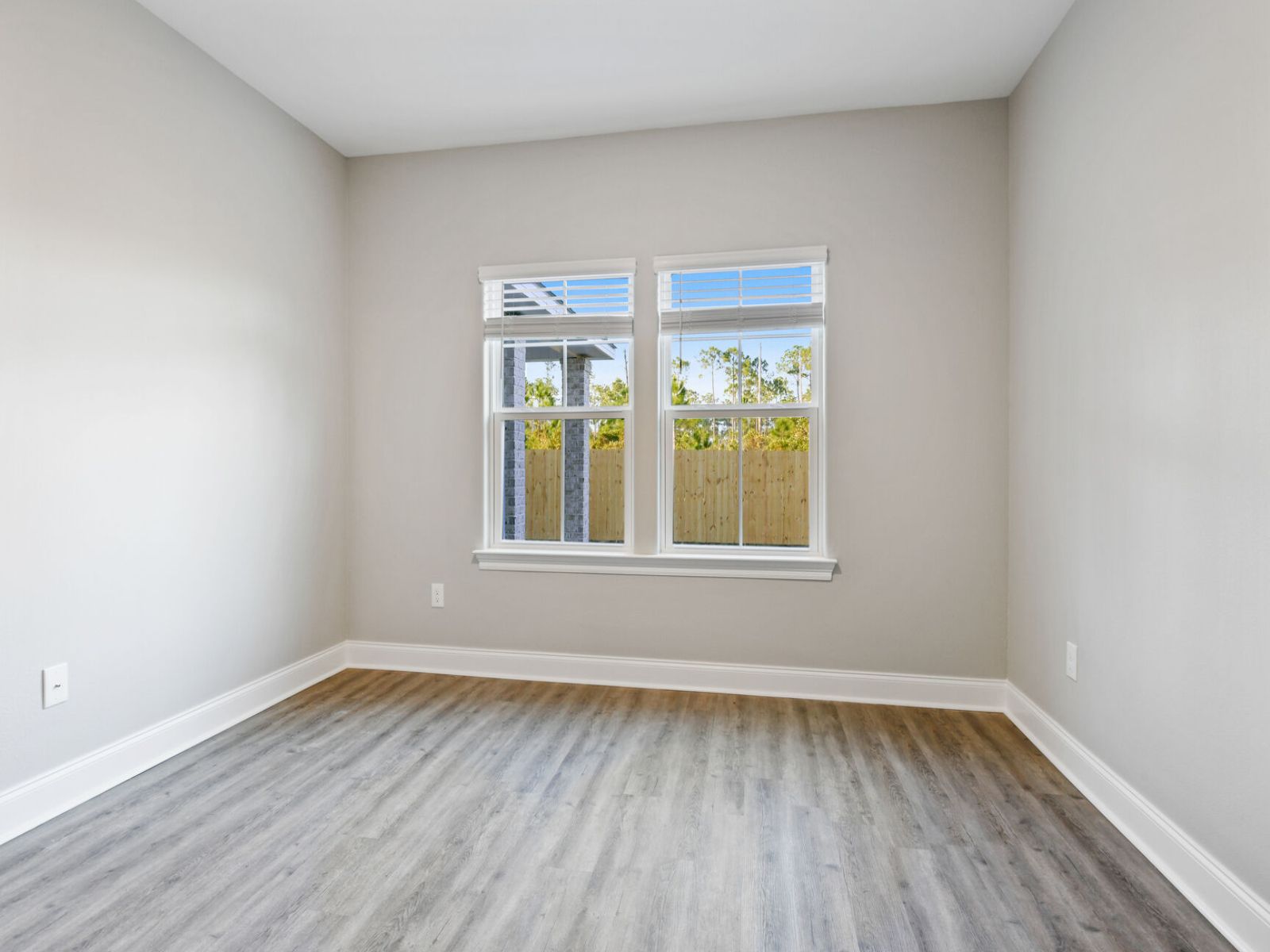 Secondary bedroom in the Elliott floorplan at a Meritage Homes community in Gulfport, MS.