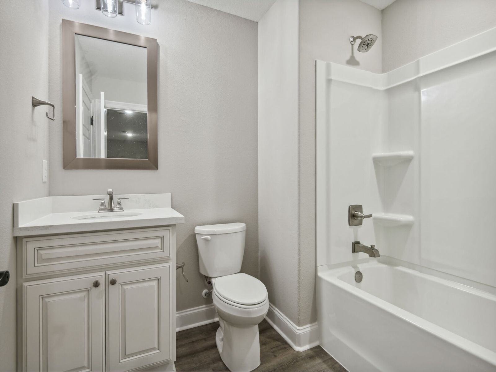 Secondary bathroom in the Elliott floorplan at a Meritage Homes community in Gulfport, MS.