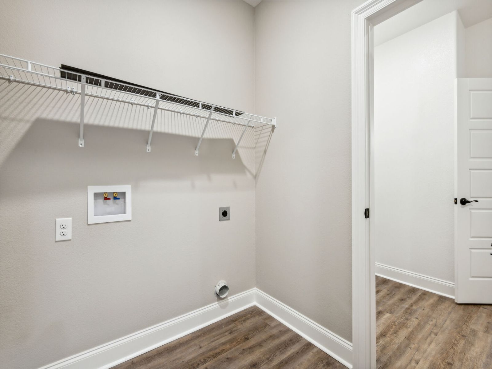 Utility room in the Elliott floorplan at a Meritage Homes community in Gulfport, MS.