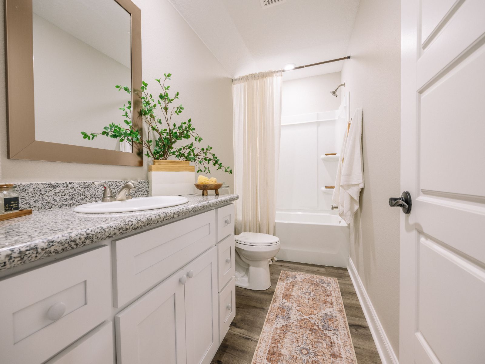 Secondary bathroom in the Kai floorplan at a Meritage Homes community in Gulfport, MS.