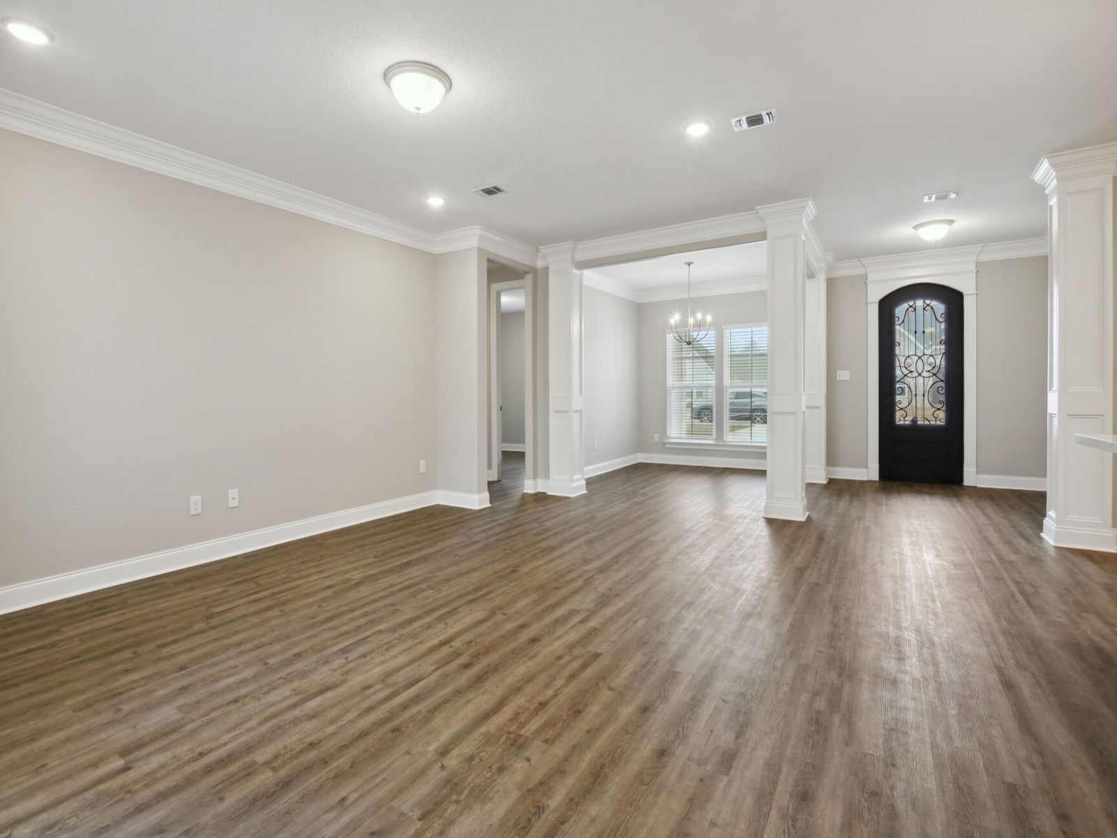 Great room in the Brooks floorplan at a Meritage Homes community in Gulfport, MS.