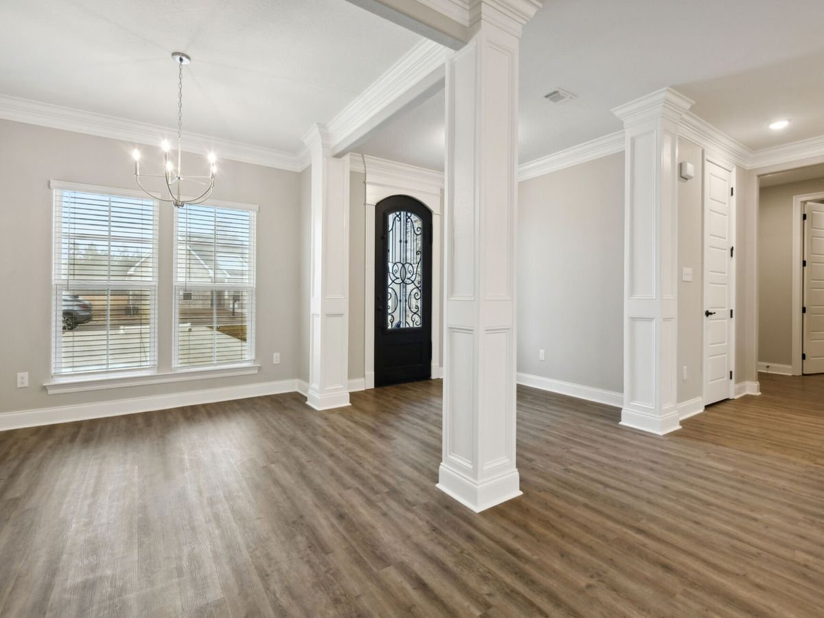 Dining area in the Brooks floorplan at a Meritage Homes community in Gulfport, MS.