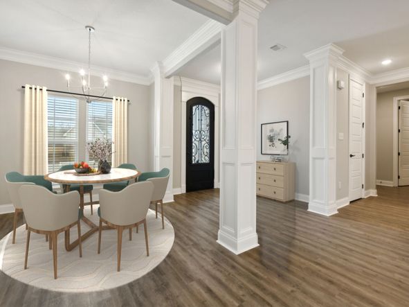 Dining area in the Brooks floorplan at a Meritage Homes community in Gulfport, MS.
