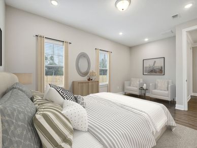Primary bedroom in the Brooks floorplan at a Meritage Homes community in Gulfport, MS.