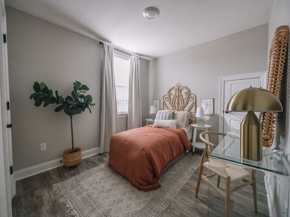 Secondary bedroom in the Coral floorplan at a Meritage Homes community in Gulfport, MS.