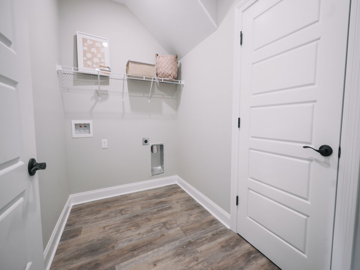 Utility room in the Coral floorplan at a Meritage Homes community in Gulfport, MS.