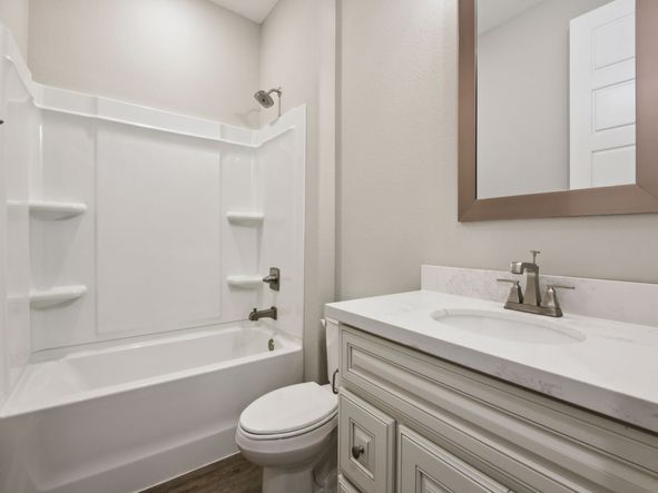 Secondary bathroom in the Brooks floorplan at a Meritage Homes community in Gulfport, MS.