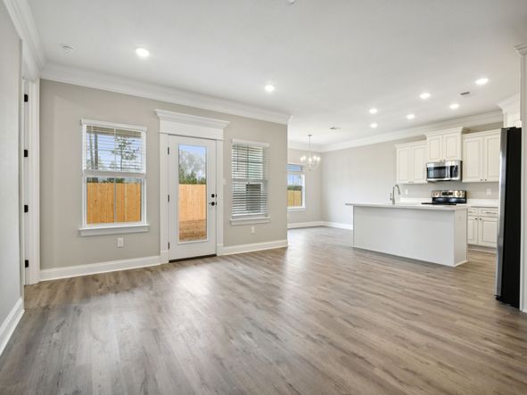 Great room in the Dune floorplan at a Meritage Homes community in Gulfport, MS.