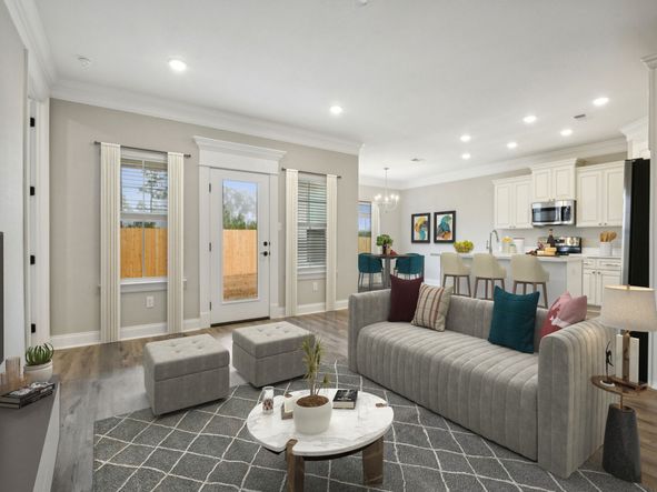 Great room in the Dune floorplan at a Meritage Homes community in Gulfport, MS.
