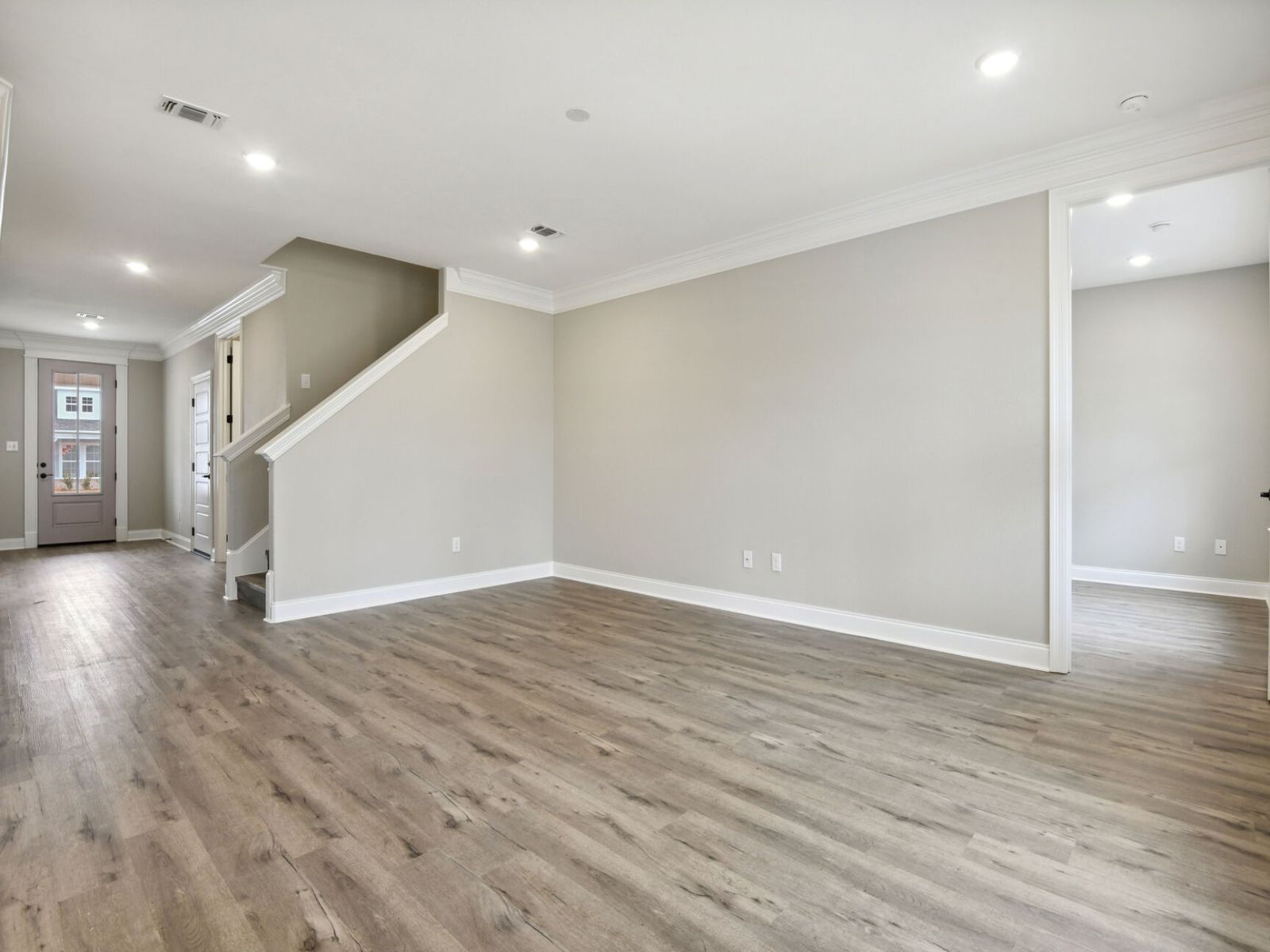 Great room in the Dune floorplan at a Meritage Homes community in Gulfport, MS.