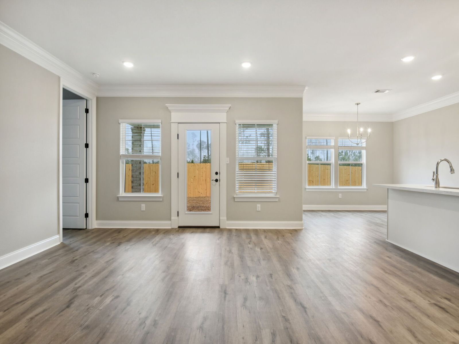 Great room in the Dune floorplan at a Meritage Homes community in Gulfport, MS.