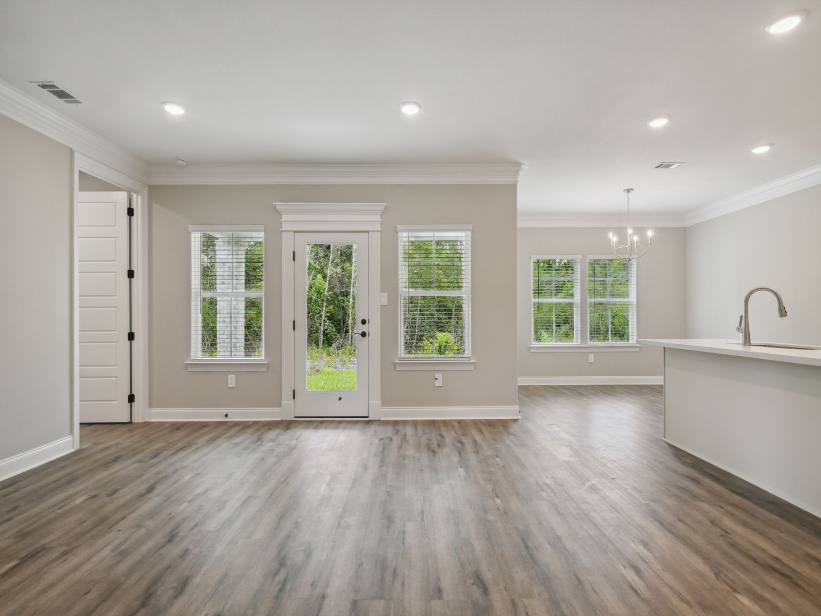 Great room in the Sandpiper floorplan at a Meritage Homes community in Gulfport, MS.