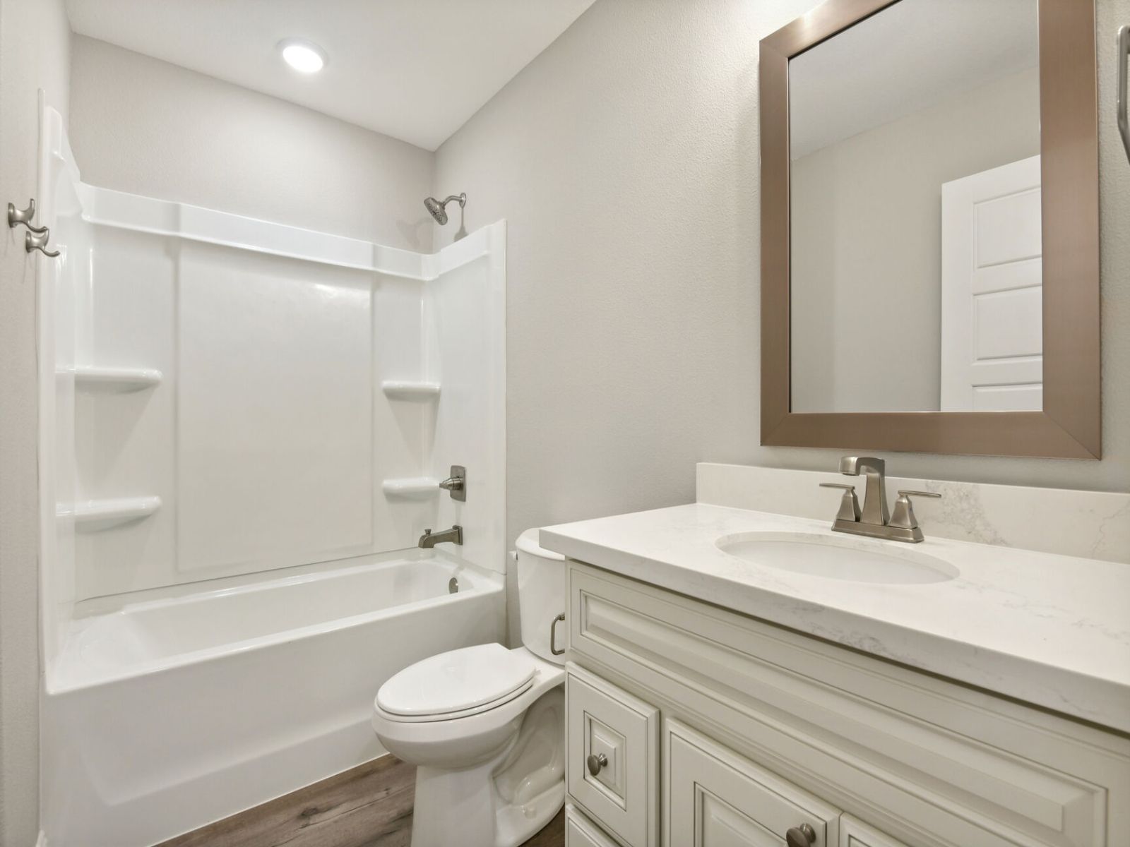 Secondary bathroom in the Dune floorplan at a Meritage Homes community in Gulfport, MS.