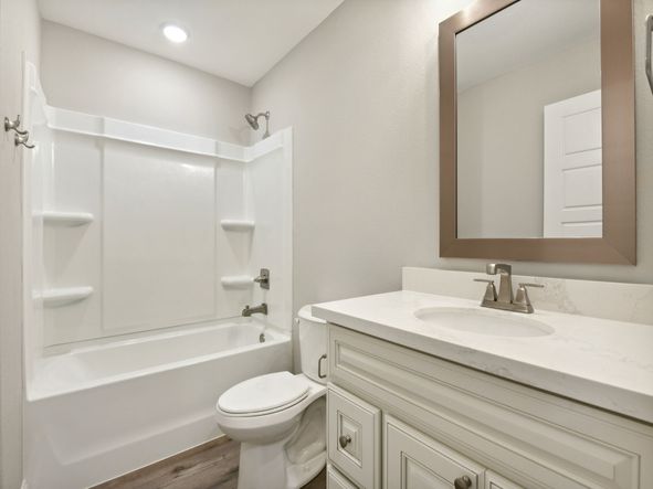Secondary bathroom in the Dune floorplan at a Meritage Homes community in Gulfport, MS.
