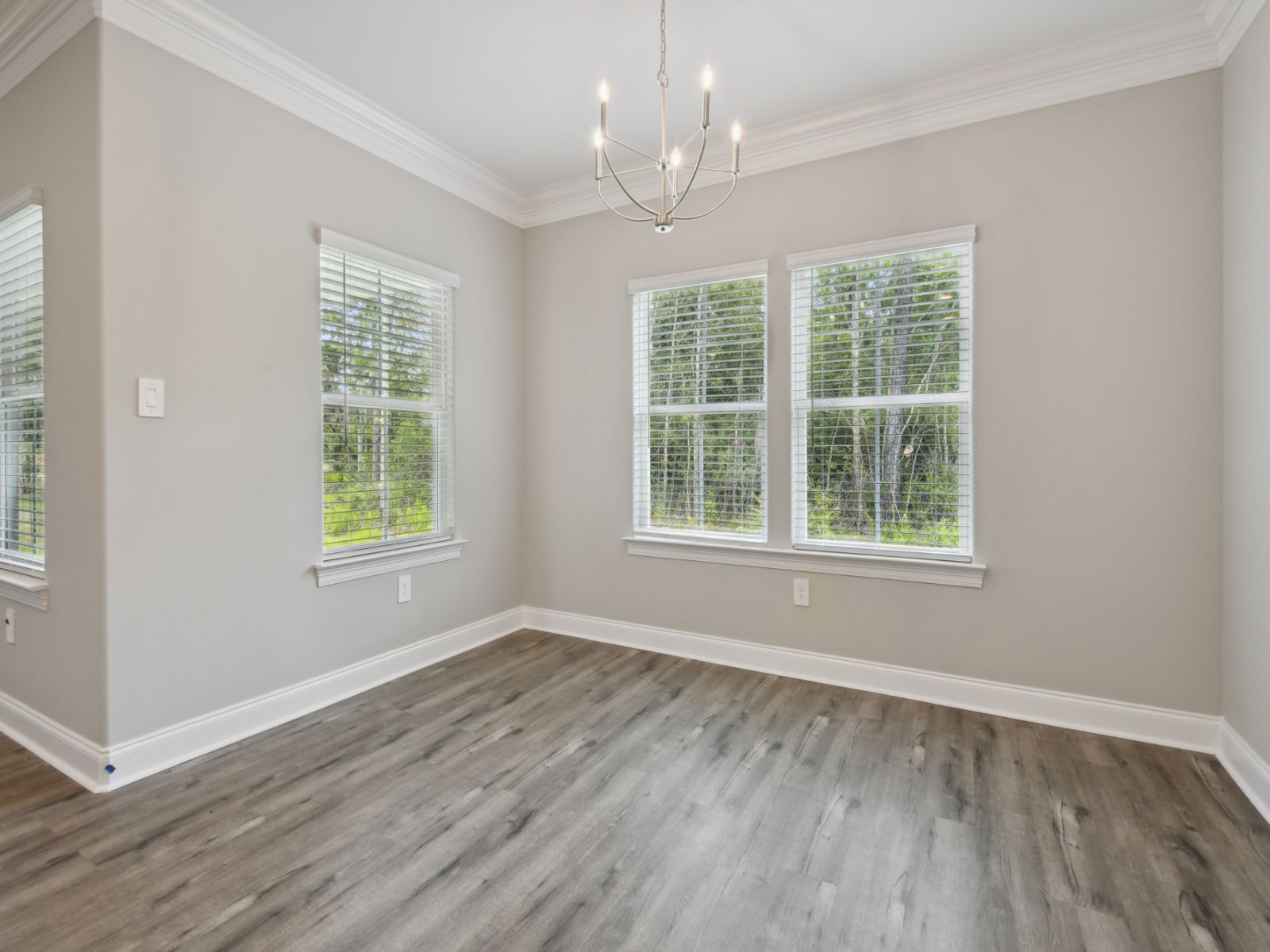 Dining area in the Sandpiper floorplan at a Meritage Homes community in Gulfport, MS.