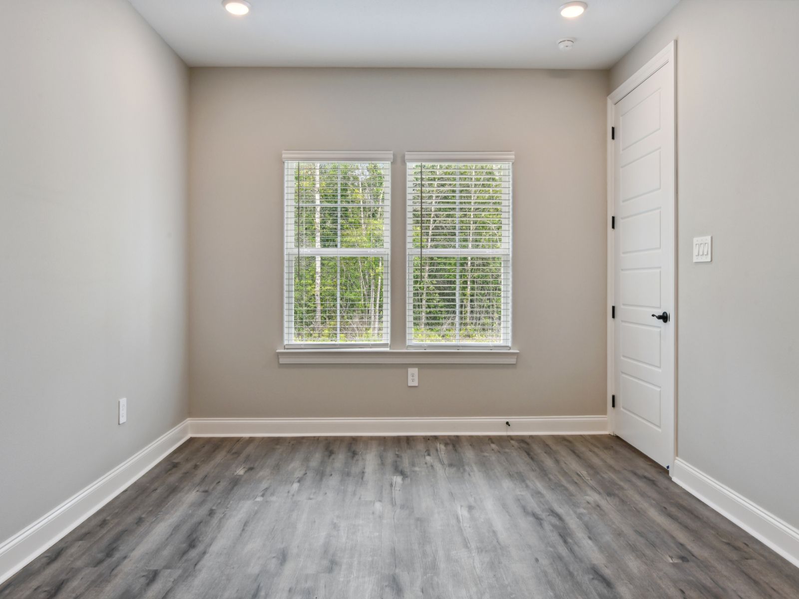 Primary bedroom in the Sandpiper floorplan at a Meritage Homes community in Gulfport, MS.