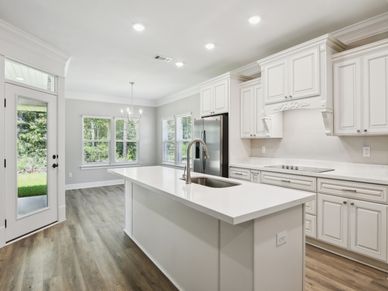 Kitchen in the Jules floorplan at a Meritage Homes community in Gulfport, MS.