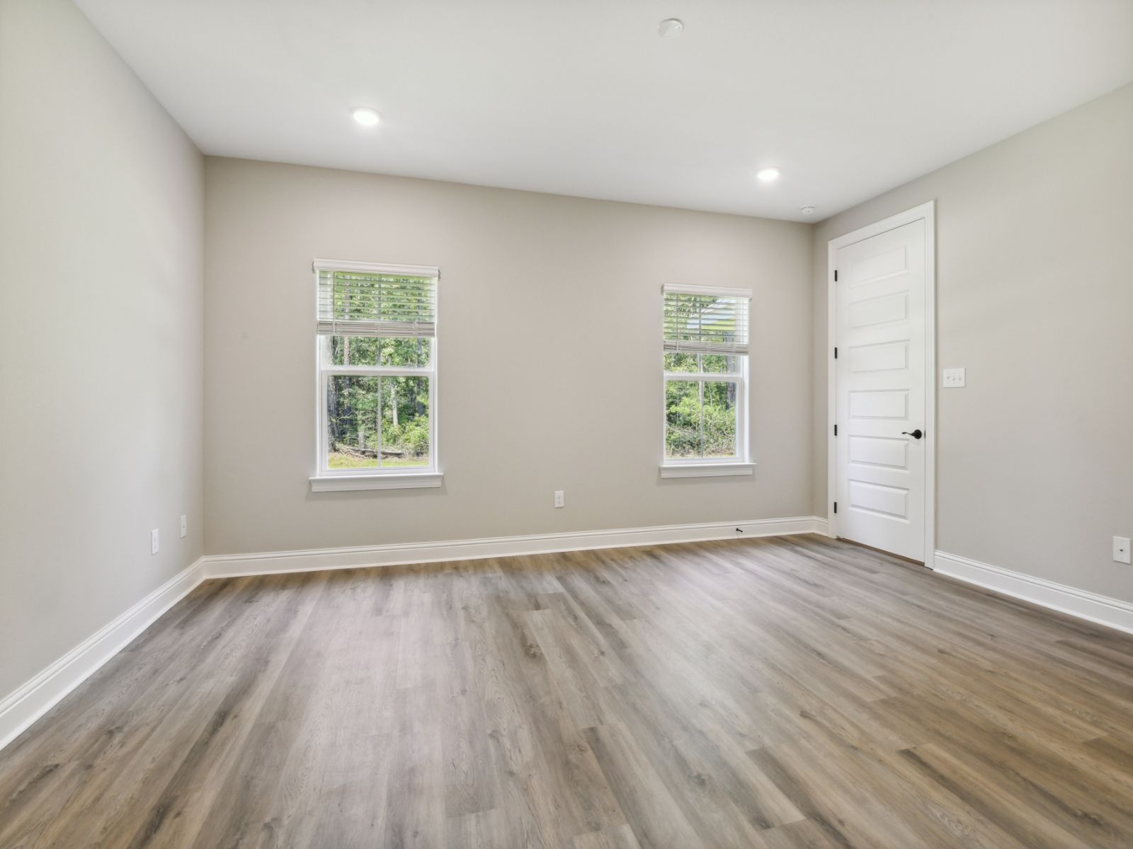 Primary bedroom in the Jules floorplan at a Meritage Homes community in Gulfport, MS.