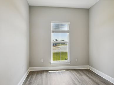 Secondary bedroom in the Jules floorplan at a Meritage Homes community in Gulfport, MS.