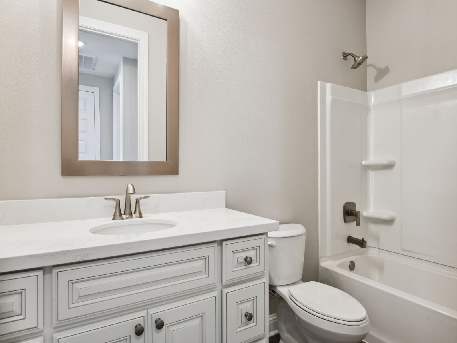 Secondary bathroom in the Jules floorplan at a Meritage Homes community in Gulfport, MS.