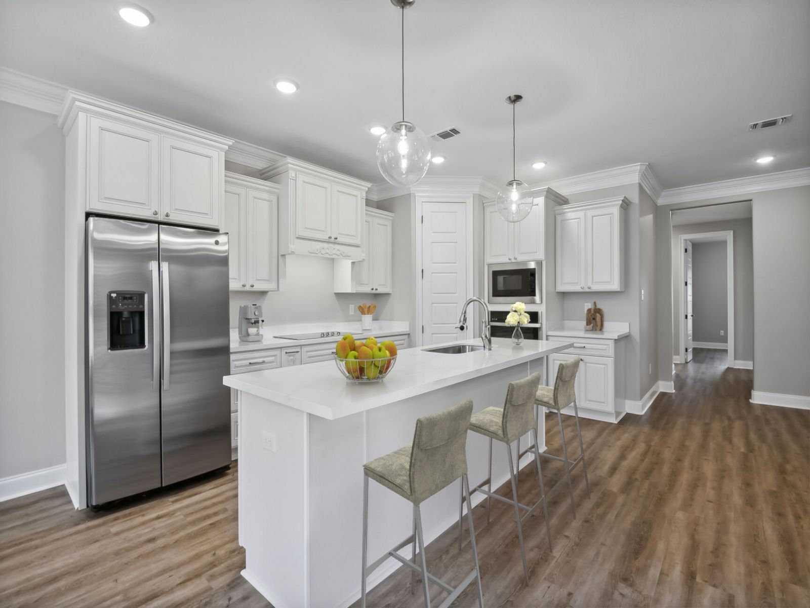 Kitchen in the Taylor floorplan at a Meritage Homes community in Gulfport, MS.