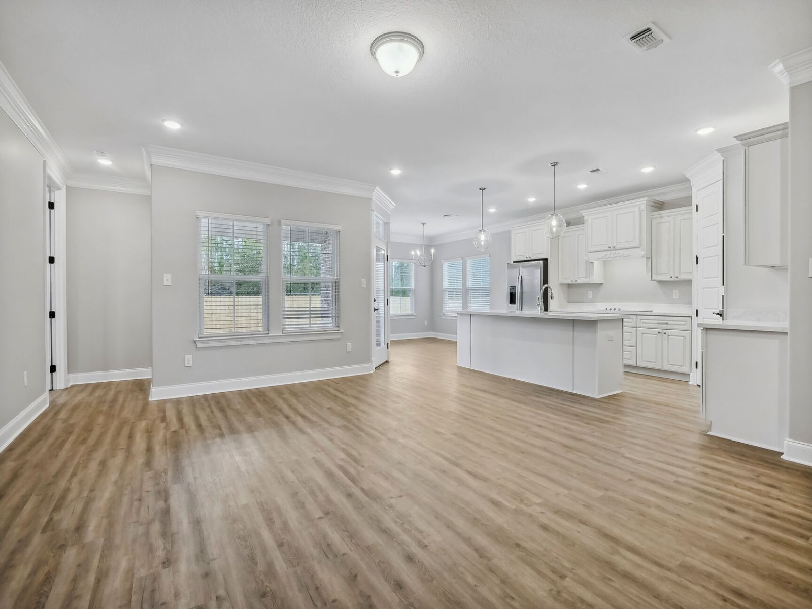 Great room in the Taylor floorplan at a Meritage Homes community in Gulfport, MS.