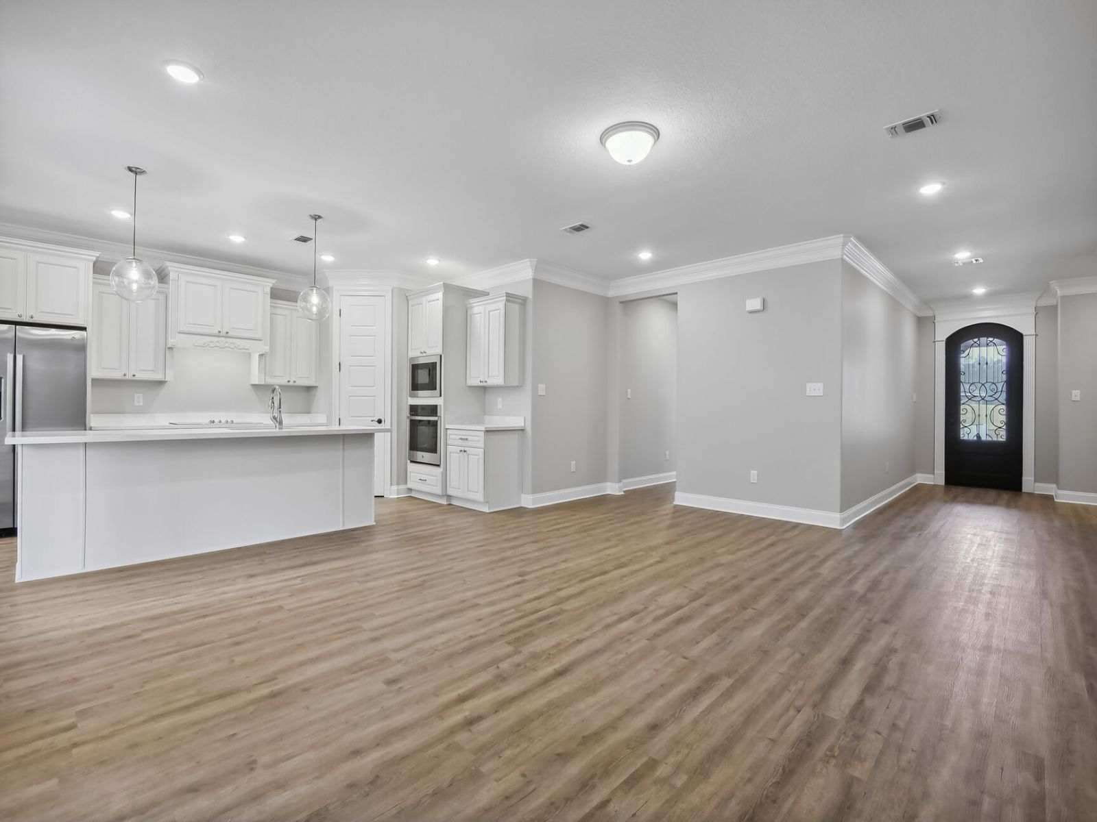 Great room in the Taylor floorplan at a Meritage Homes community in Gulfport, MS.