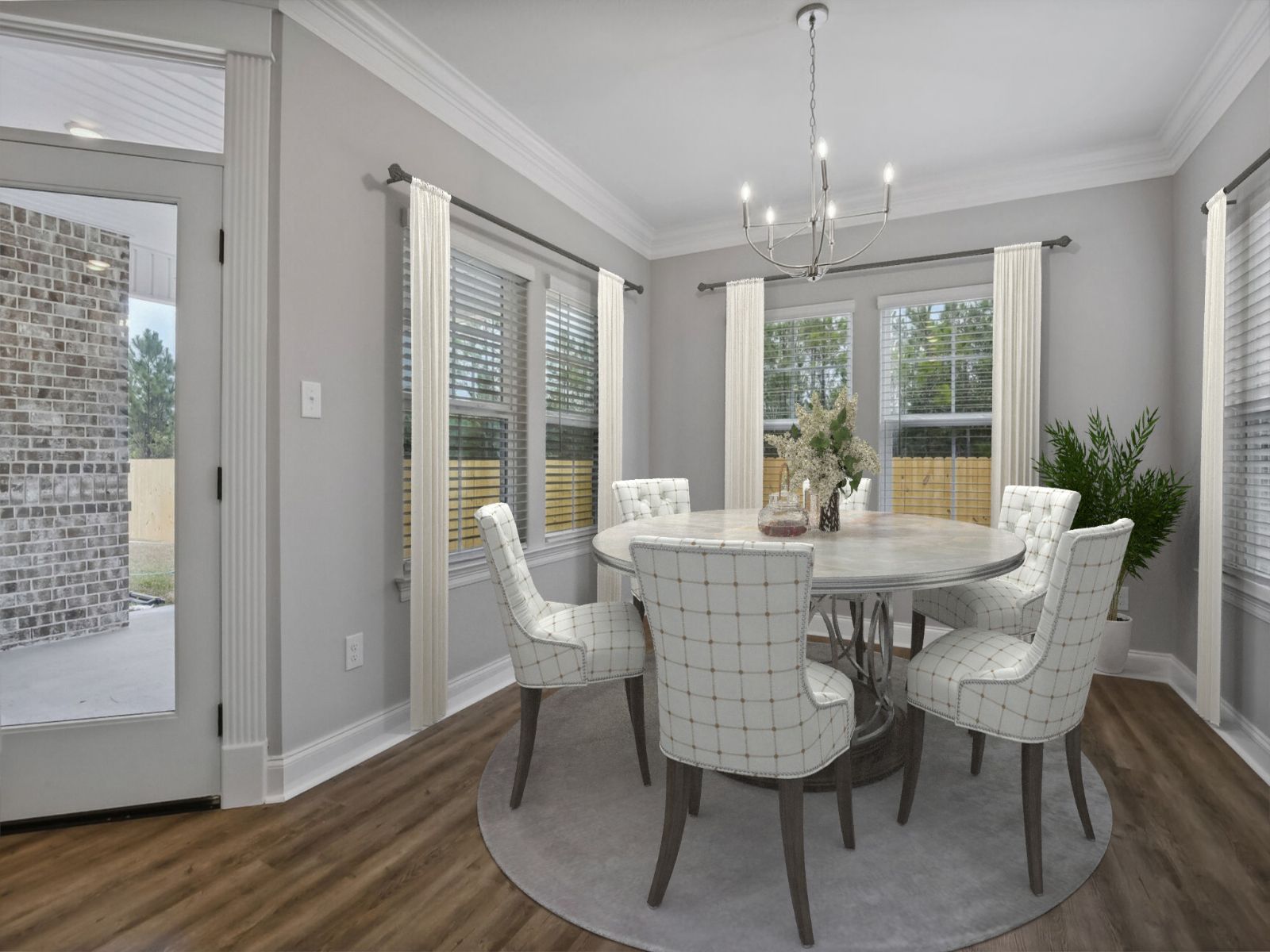 Dining area in the Taylor floorplan at a Meritage Homes community in Gulfport, MS.
