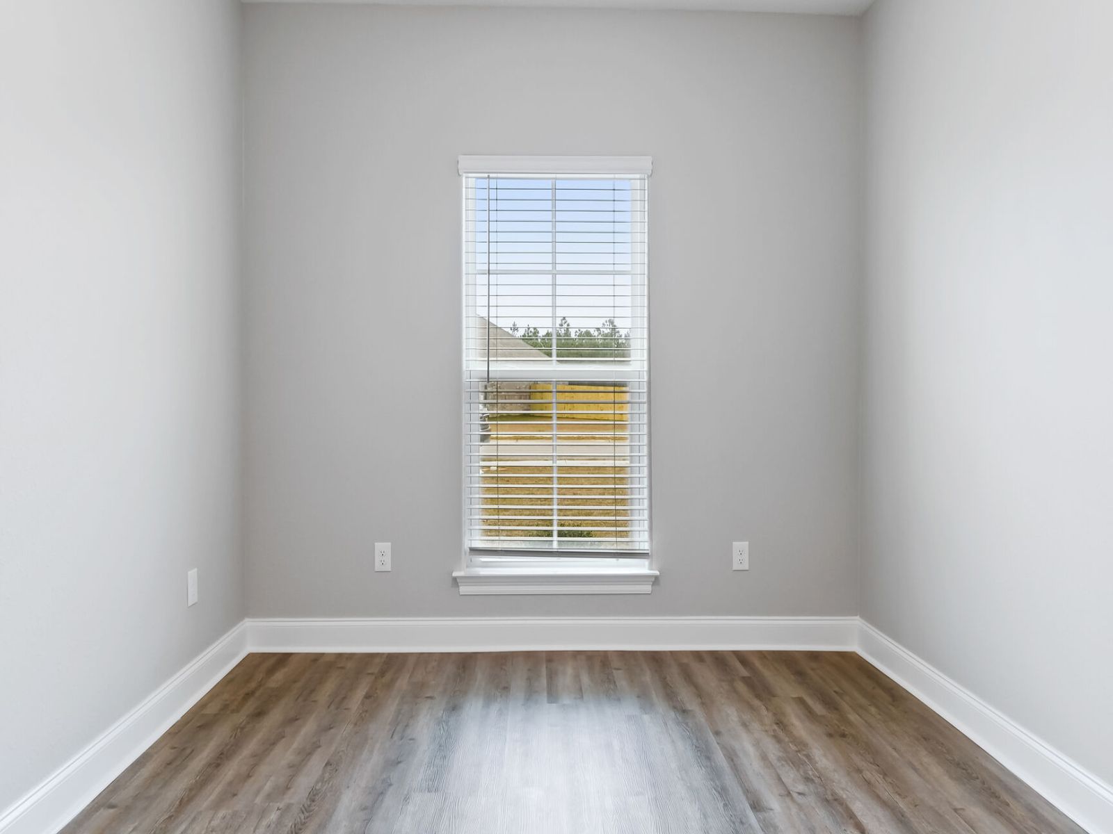 Secondary bedroom in the Taylor floorplan at a Meritage Homes community in Gulfport, MS.