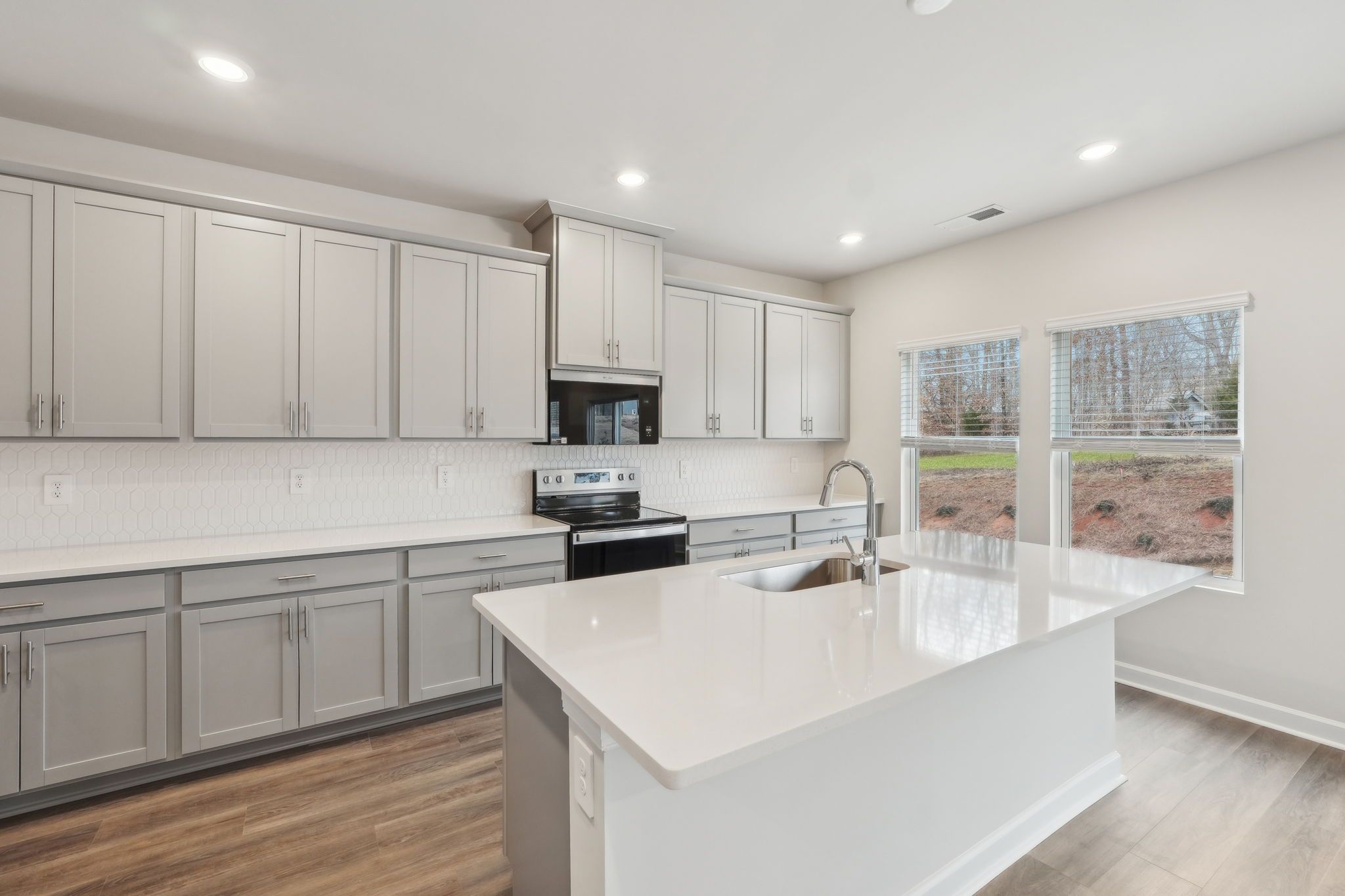 Cook your favorite meal in the modern and functional kitchen.