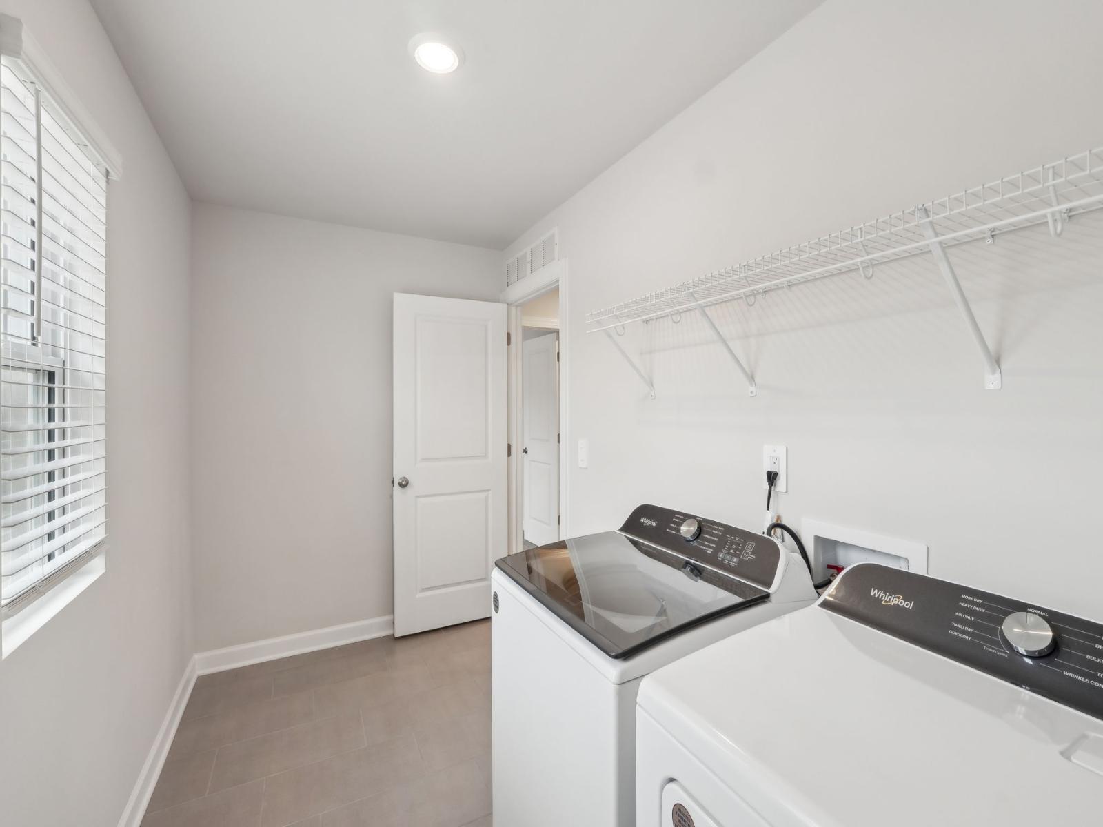 Laundry day just got easier with your oversized space to sort, organize, and fold your clothes.