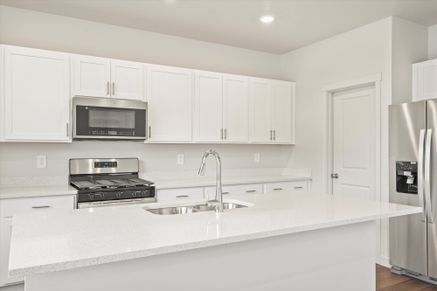 The Pine floorplan interior image taken at a Meritage Homes Community in Tooele, UT.