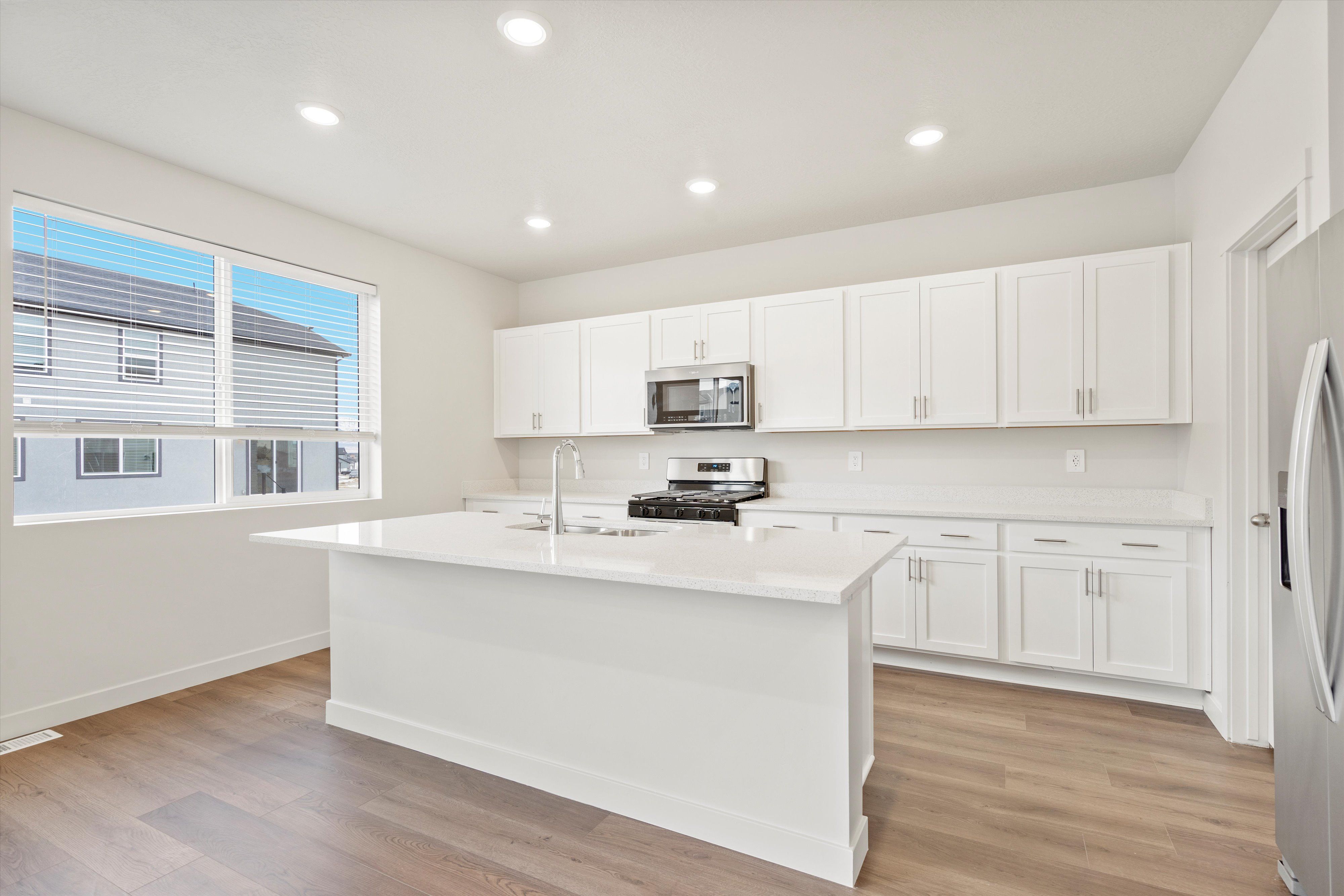 The Pine floorplan interior image taken at a Meritage Homes Community in Tooele, UT.