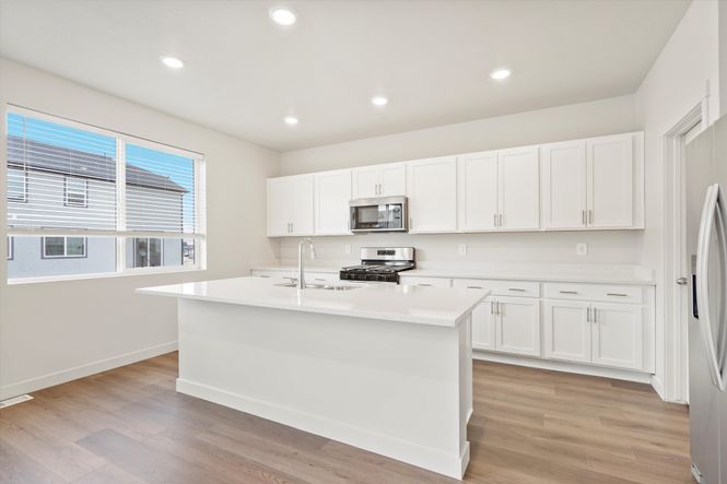 The Pine floorplan interior image taken at a Meritage Homes Community in Tooele, UT.