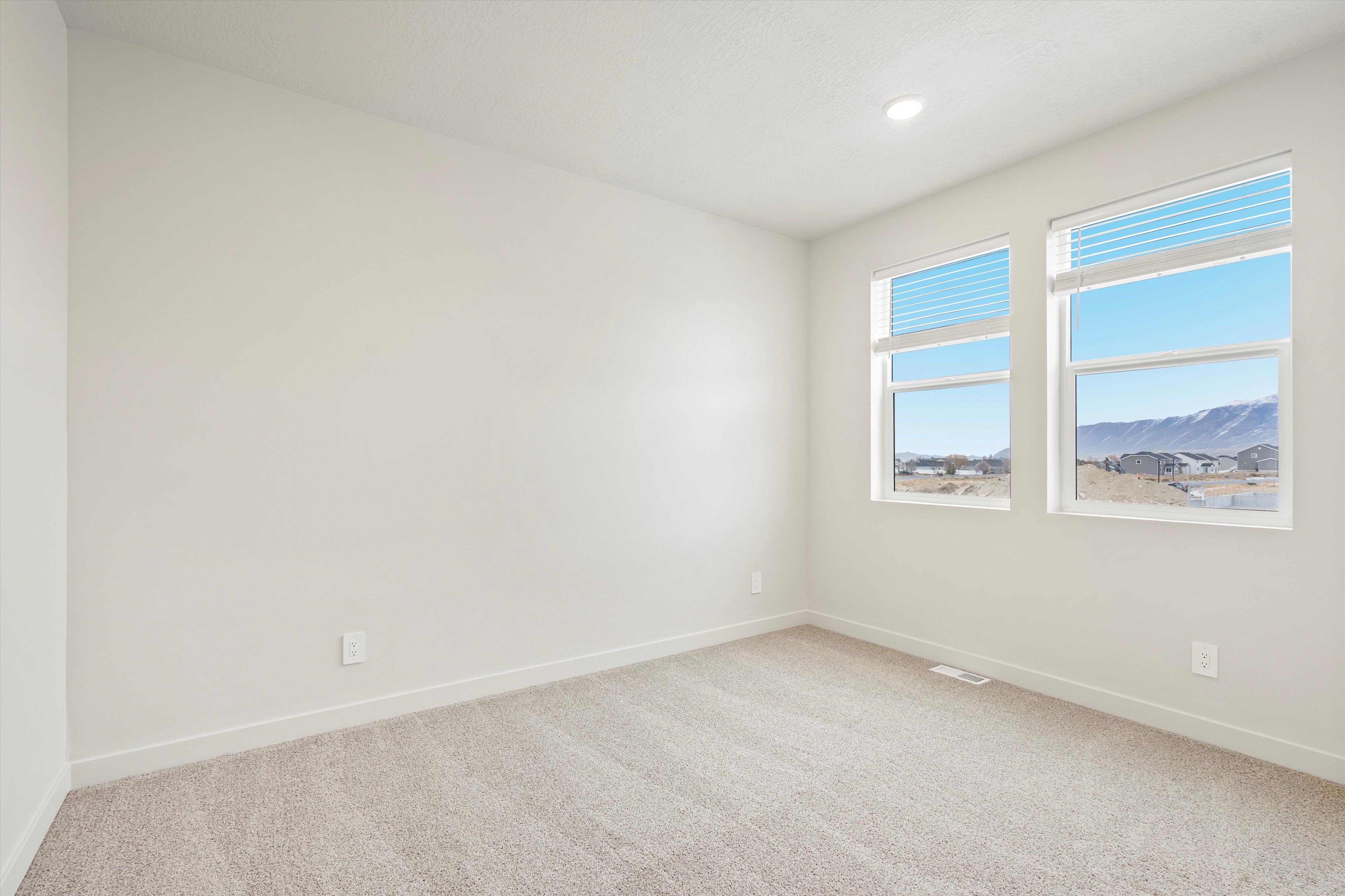 The Pine floorplan interior image taken at a Meritage Homes Community in Tooele, UT.