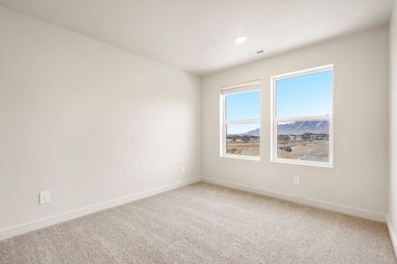 The Pine floorplan interior image taken at a Meritage Homes Community in Tooele, UT.