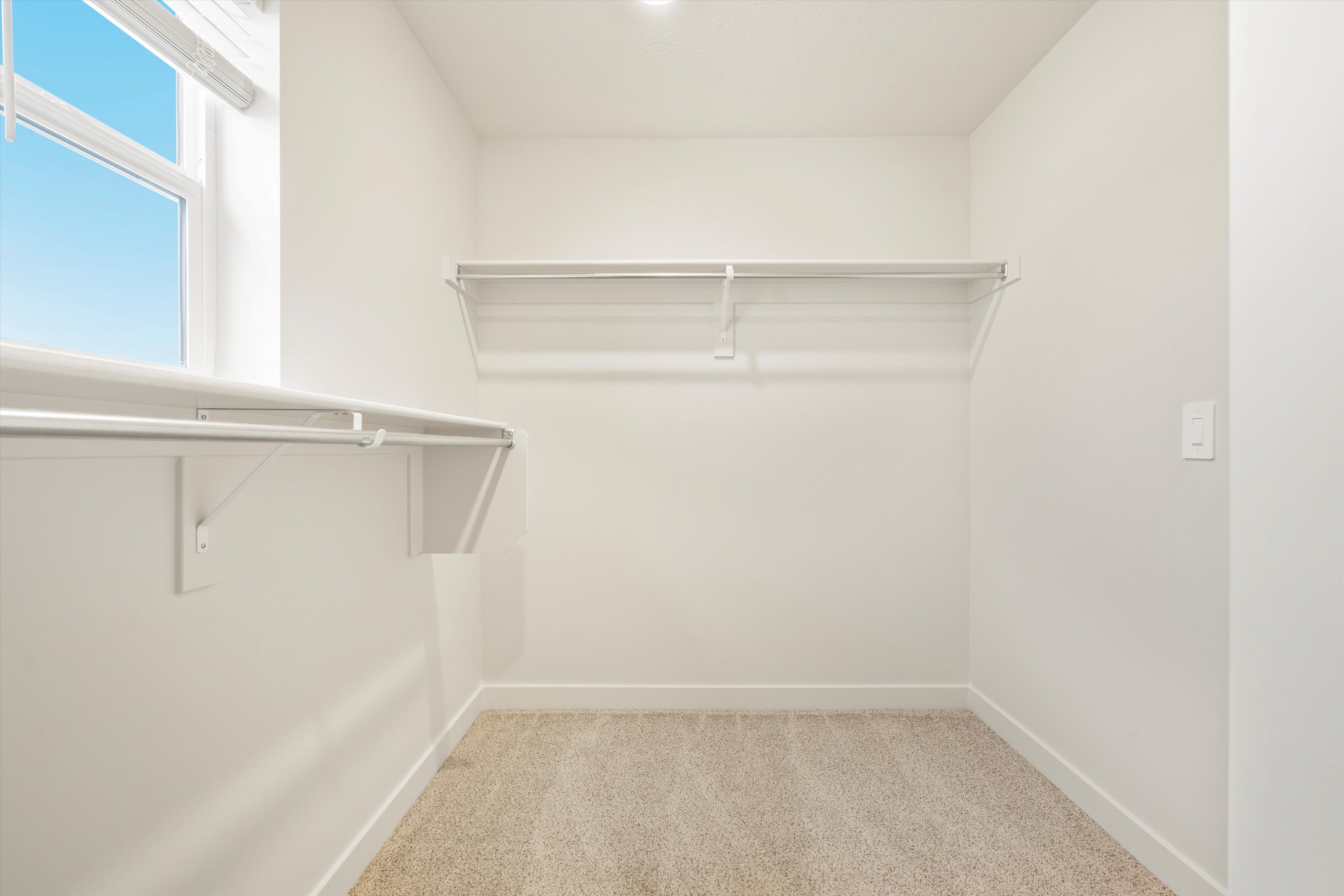 The Pine floorplan interior image taken at a Meritage Homes Community in Tooele, UT.