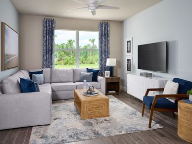 Great room in the Corsica floorplan modeled at Brystol at Wylder