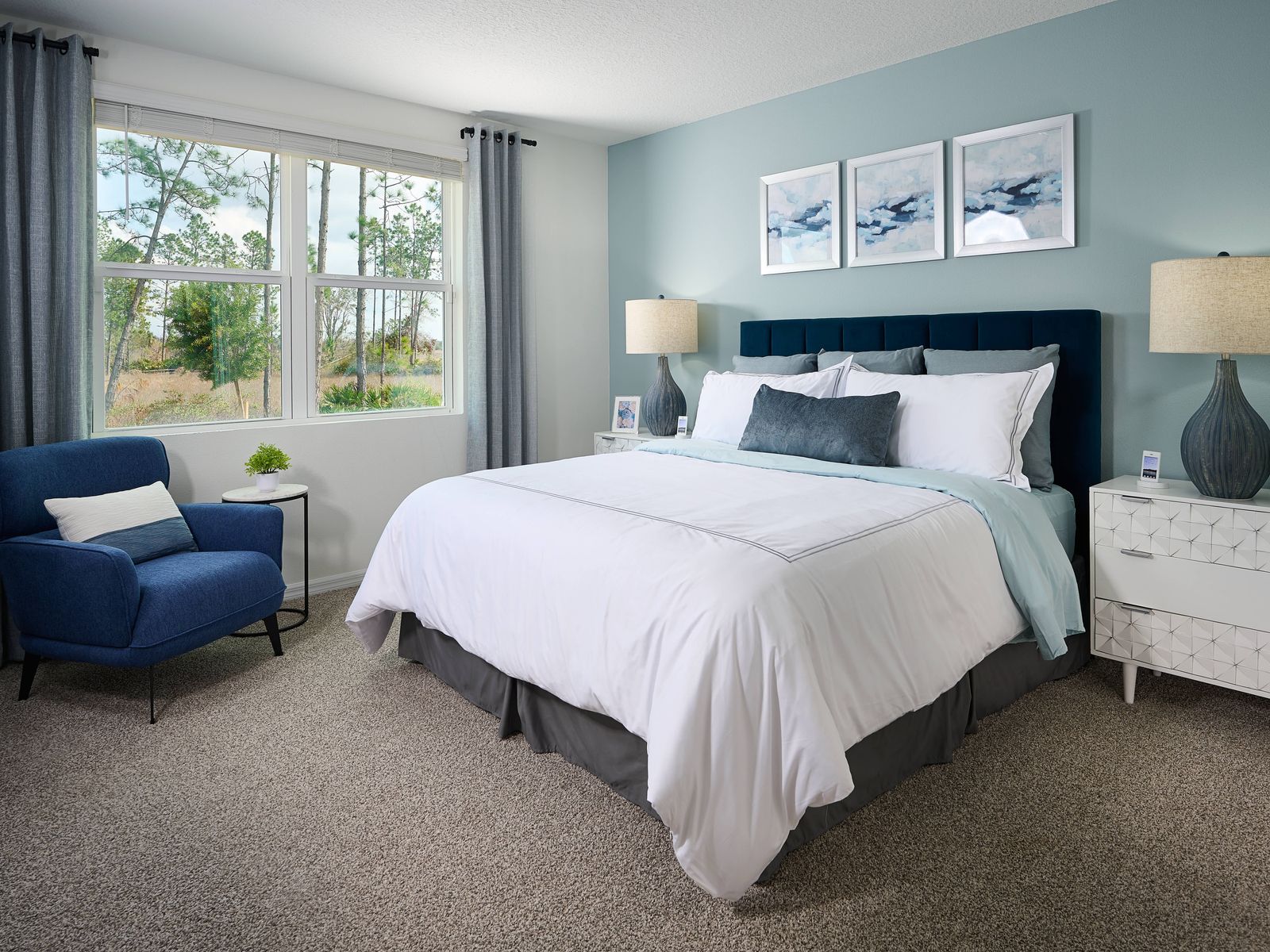 The Primary Bedroom of the Essex Floorplan Modeled at Two Rivers.