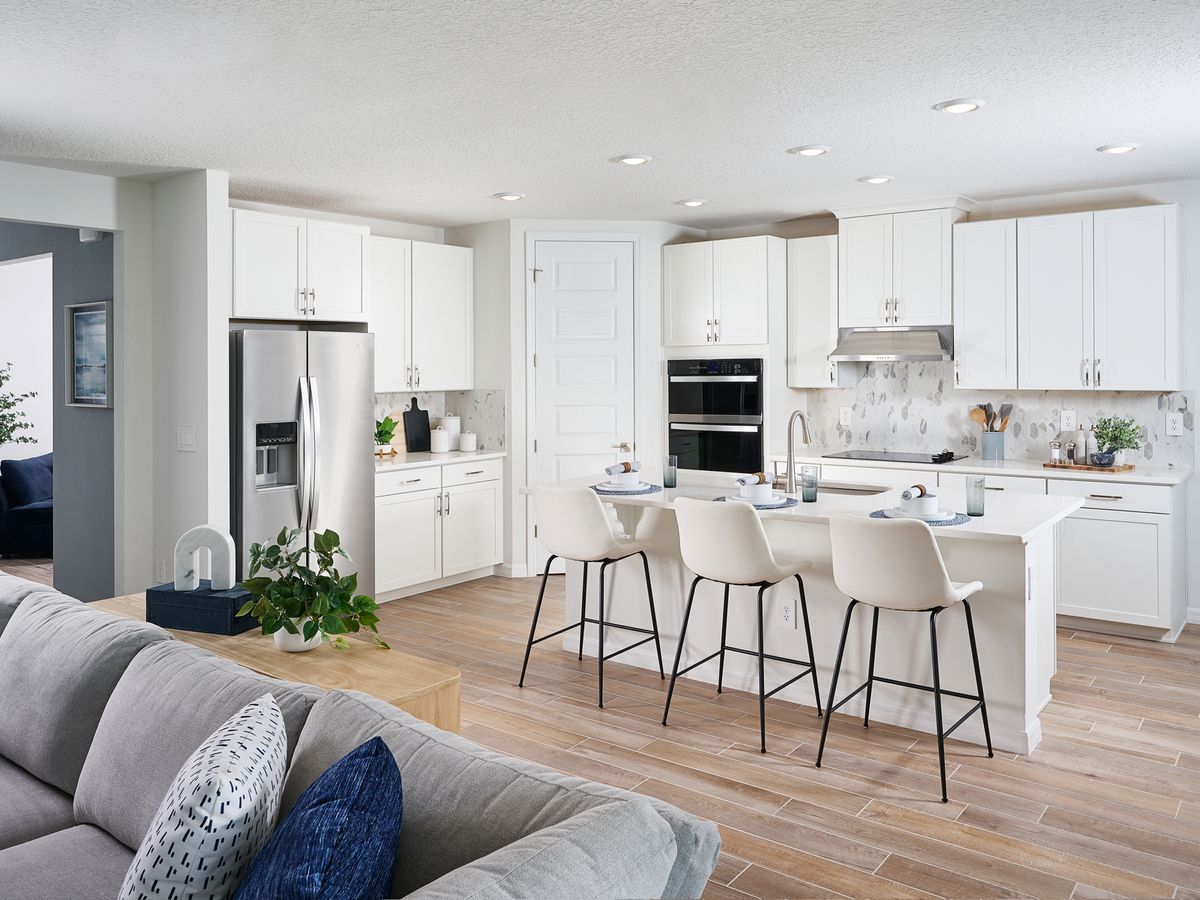The Jasmine floorplan modeled at The Grove at Stuart Crossing.