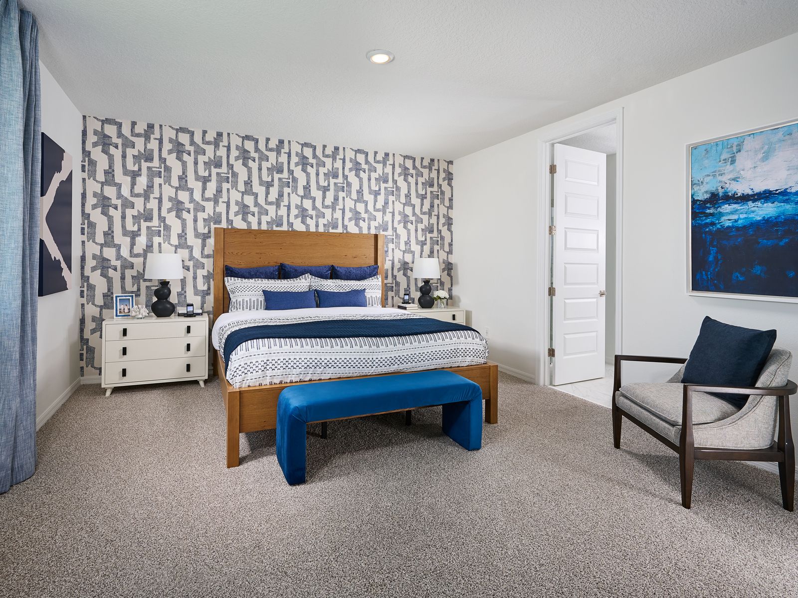 The Primary Bedroom of the Jasmine Model at the Grove at Stuart Crossing.