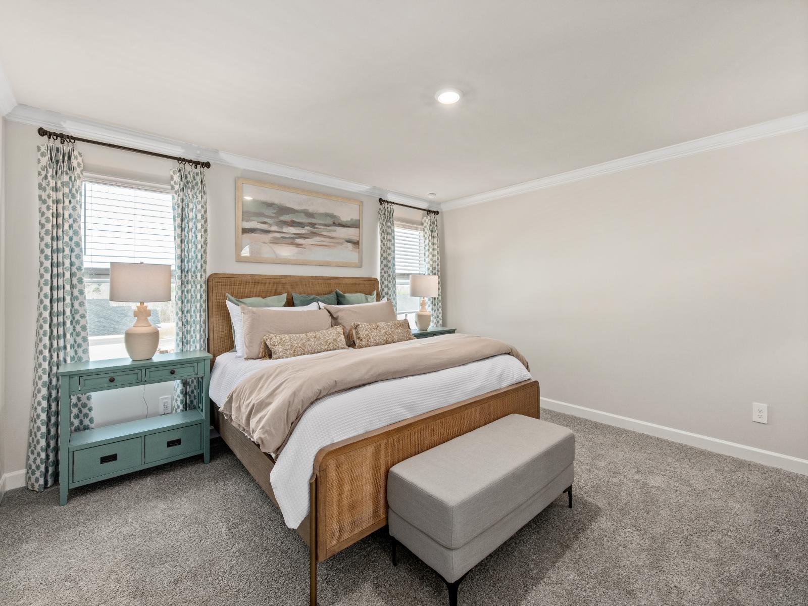 Relax and unwind in your spacious new primary bedroom.