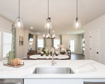 The kitchen overlooks into the dining room and living room, the perfect setup for hosting.