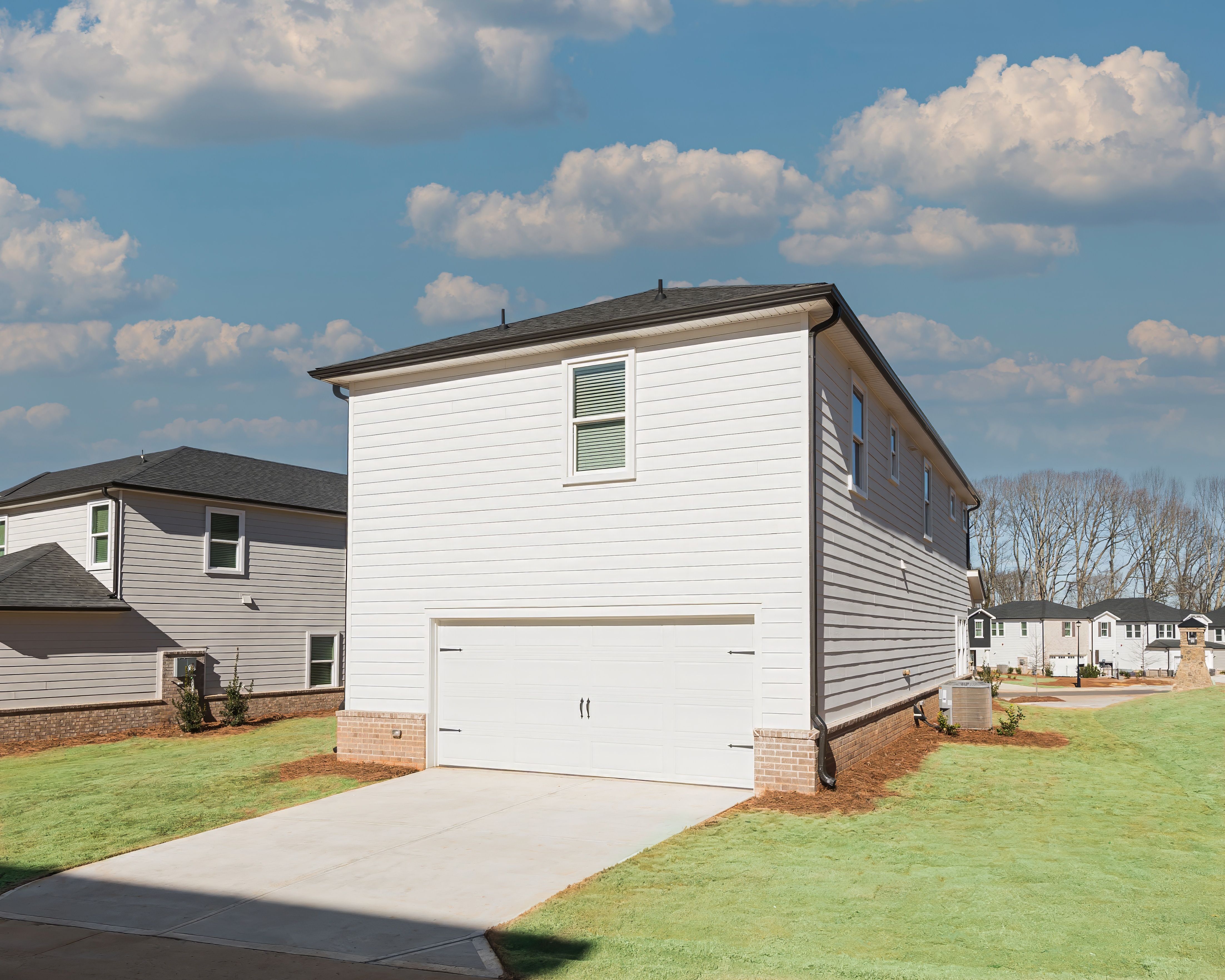The garage entrance is located at the back of the home.
