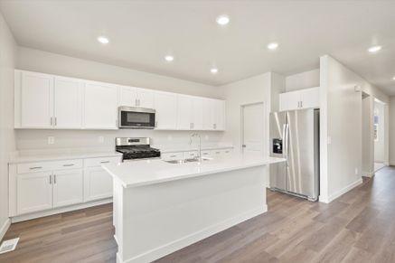 The Pine floorplan interior image taken at a Meritage Homes Community in Tooele, UT.